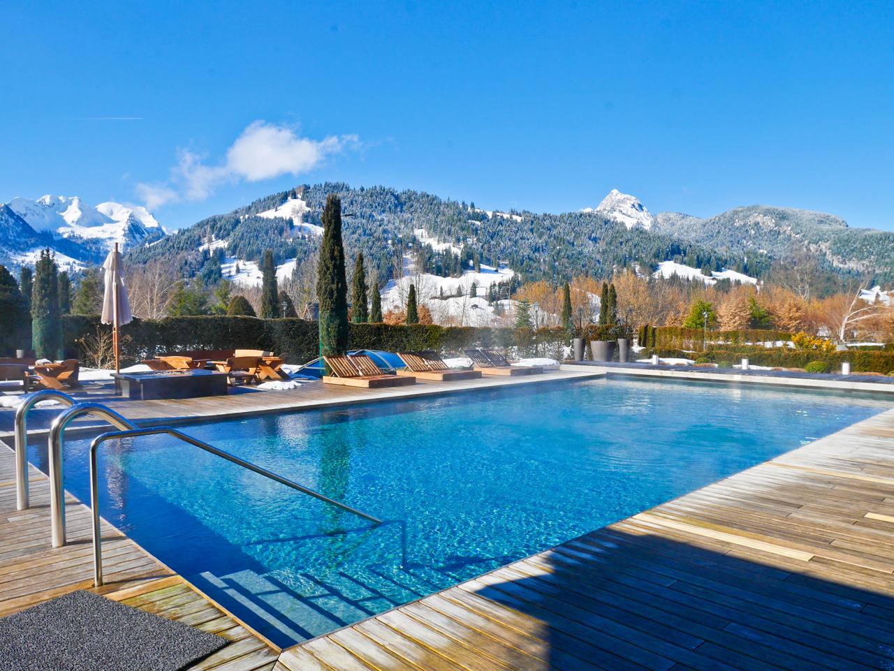 Alpina Gstaad - Outdoor Pool and Mountains